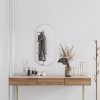 Nástenné zrkadlo strieborné 80x35 cm okrúhle-ForU-348192