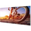 Obraz plexi Bicykel horskej ceste západ 100x50 cm