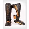 Chrániče holení a nártů Venum ELITE EVO - Black/Bronze Velikost: M