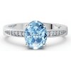 Zlatý dámsky prsteň DF 3384 z bieleho zlata, s topásom Swiss Blue a diamantmi 64
