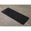 TENDANCE Predložka do kúpeľne Stones, 45x120 cm, čierna