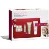 Clarins Nutri-Lumiére revitalizačný denný krém 50 ml + výživný krém 10 ml + výživný nočný krém 15 ml + ošetrujúci krém na ruky a nechty 30 ml + kozmetická taška, kozmetická sada pre ženy