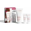 Clarins Body Hydration Clarins Moisture-Rich Body Lotion výživné telové mlieko 200 ml + Clarins Hand and Nail Treatment Care ošetrujúci krém na ruky a nechty 30 ml + Clarins Exfoliating Body Scrub for