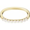 Calvin Klein Pevný pozlátený náramok s perličkami Circling KJAKJD14010 5,4 x 4,3 cm - XS