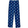Outerstuff Dětské pyžamové kalhoty Tampa Bay Lightning NHL Team Colored Printed Pant Veľkosť: Dětské L (11 - 12 let)