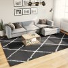 vidaXL Chlpatý koberec vysoký vlas moderný čierno-krémový 240x340 cm 375417