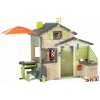 Domček Priateľov s posedením v natur farbách Friends House Evo Playhouse Life Smoby pod slnečníkom s hrami s meteorologickou sadou rozšíriteľný