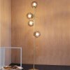 Dyberg Larsen Como stojaca lampa, 4 svetlá, mosadz - 8143