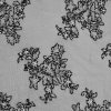 Vyšívaný tyl 55036-001 čierny, biely kvet, perličková výšivka, š.135