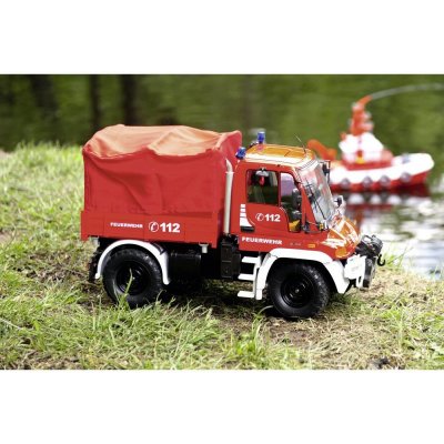 Carson Modellsport MB Unimog U300 Feuerwehr RC model auta elektrický záchranný voz 100% RTR 2,4 GHz vr. akumulát 1:12