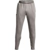 Pánske nohavice Under Armour Armour Terry Pant - Pánske tepláky Armour Terry s vreckami a zipsami na členkoch od Under Armour, v rôznych farbách.