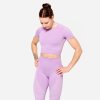 DOMYOS Dámske crop top tričko 900 na fitness bezšvové ružové S