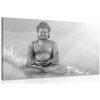 Obraz socha Budhu v meditujúcej polohe v čiernobielom prevedení