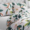 Biante Bavlnené posteľné obliečky Sandra SA-293 Magnólia so zelenými listami na bielom Predĺžené 140x220 a 70x90 cm