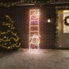 Vianočná ozdoba Mikuláš na rebríku, 552 LED, 50 x 200 cm