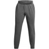 Pánske nohavice Under Armour, STRETCH WOVEN JOGGERS tmavo sivá md