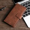 Peňaženkové kožené puzdro Crocodile Clasp na Xiaomi Redmi Note 10/10S - Hnedá