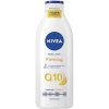 Nivea Q10 Plus Firming + Vitamin C spevňujúce telové mlieko na suchú pokožku 400 ml