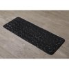 TENDANCE Predložka do kúpeľne Stones, 45x120 cm, čierna