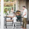 Big Green Egg Large v základnom EGGráme s doplnkovým rámom s agátovými policami a roštom, na kolieskach, s viacúrovňovým roštom L