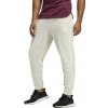 Pánske nohavice Adidas PLR Knit - Pánske športové nohavice PLR Knit s bočnými vreckami a zipsami pri členkoch od značky Adidas, béžové vyhotovenie. - 3429666