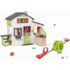 Set domček Priateľov s kuchynkou a obojstranná hojdačka Friends House Life Smoby obojstranná 360° stupňové točenie s vodotryskom rozšíriteľný