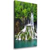 Vertikálny foto obraz na plátne Vodopád v lese 50x100 cm