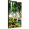 Vertikálny foto obraz na plátne Vodopád v džungli 50x100 cm