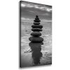 Vertikálny foto obraz na plátne Kamenia na pláži 50x100 cm