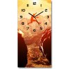 Nástenné hodiny Skok nad priepasťou 30x60 cm