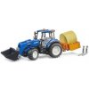 Bruder Traktor New Holland T5.120 s čelním nakladačem, korbou, vidlemi a kulatým balíkem