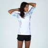 OLAIAN Dievčenské tričko 500 Palm proti UV žiareniu s krátkym rukávom na surf biele 131-140 cm