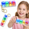 Fidget prívesok na kľúče proti stresu 4 prepínače kliker LED svietiaci