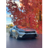 Model auta Ford Mustang GTD, 2025, tmavo šedá. Mierka 1:18.