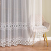 Biela tylová vyšívaná záclona Viktoria Výška: E 249 - 275, Šírka pred nariasením: 210