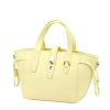 Malá pastelovo žltá kožená kabelka do ruky Italy