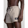 Pánske plavky KM0KM00979 PE0 beige - Calvin Klein L
