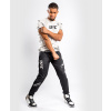 Pánské tepláky Venum UFC Authentic Fight Week 2.0 - Black/Sand Velikost: S