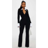 Čierny overal s dlhým rukávom a kontrastným golierom #Veľkosť XS Farba Čierna