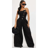Čierny overal bez ramienok s asymetrickým výstrihom #Veľkosť XS Farba Čierna