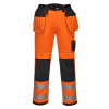 PORTWEST HI-VIS PW306 / Reflexné strečové nohavice, 12 vreciek - HV oranžová/čierna UK 48/EU 64/66