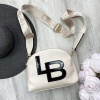 Kabelka crossbody Laura Biaggi X866 béžová