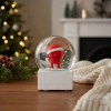 HOPTIMIST SANTA 8 cm - sklenená snehová guľa s figúrkou Mikuláša, červená