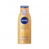 Nivea Q10 Firming+ Bronze spevňujúca tonovacie telové mlieko 400 ml