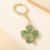 B-TOP Dizajnová zlatá kľúčenka Štvorlístok pre šťastie s kamienkami