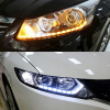 Tečúci smerový ukazovateľ + denné LED svetlá DRL