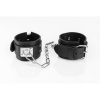 Whips Primal Bond Classic Cuffs Large Black, kožené putá s reťazou pre obvod 22–27 cm