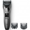 Panasonic ER-GC63 zastrihávač brady, vlasov a tela (0,5-20 mm, nastavenie dĺžky 39, nastavovací gombík, 2 hrebeňové čiapky, 45-stupňová čepeľ), sivá