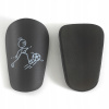 Mini futbalové chrániče čierne S 10x6 cm - ultraľahké 21 g - s potlačou