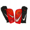 CHRÁNIČE HOLENÍ NIKE MERCURIAL LITE CR7 CHRÁNIČE NA HOLEŇ ČERVENÁ, L